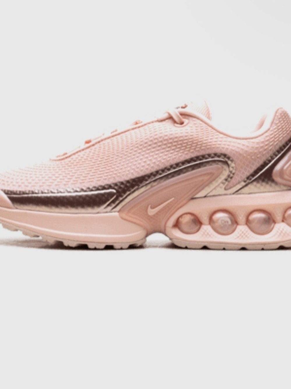 Nike Air Max Dn Women's in the colorway Washed Coral / Guava Ice
